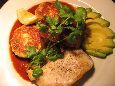 grilled fish of the day with quinoa cakes, roasted ancho  chili coulis and tangy onions